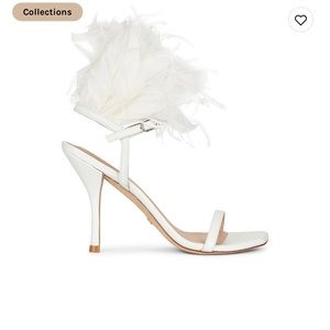 White Stewart Weitzman heels feathers